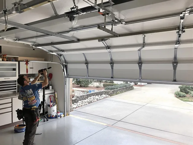 Garage door track repair service by University Heights Garage Door Repair in University Heights